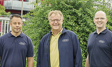 Martin Tigges (Mitte) mit den langjährigen Mitarbeitern Christian Reinartz (li.) und Christopher Haag.